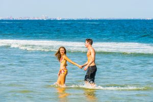 Couple in Water at Beach