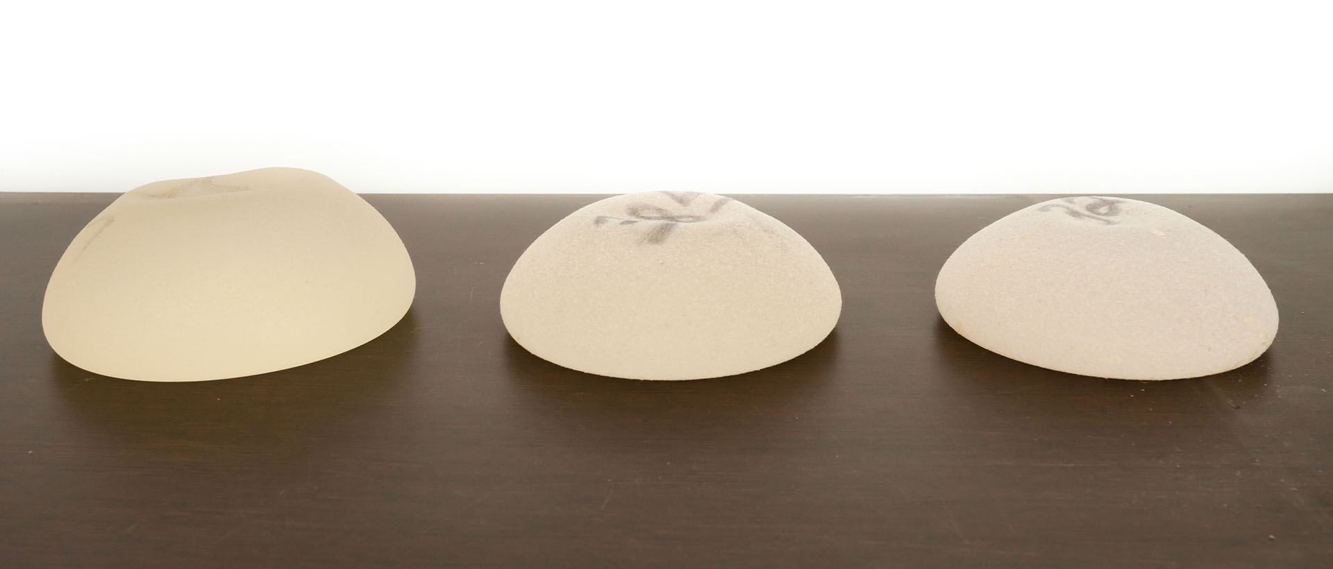Breast Implants, various sizes on White background